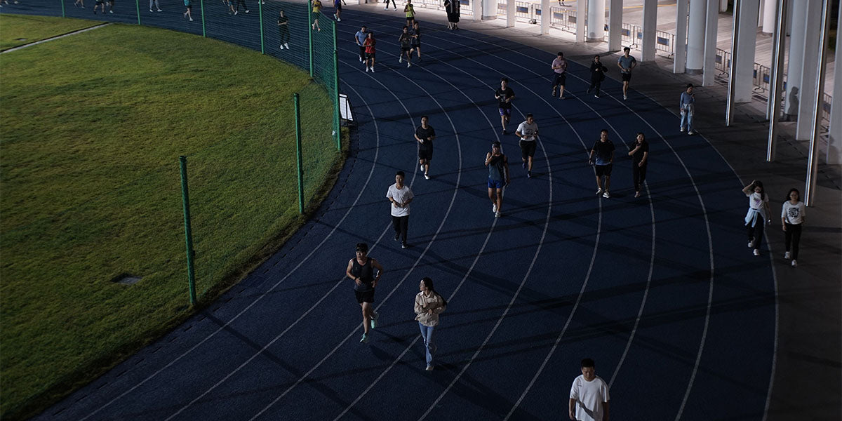 How to Increase Running Speed: Polarized Training, Cadence Mechanics, and Friction-Free Apparel Solutions