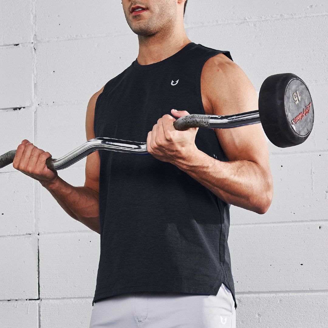 Athlete training in a black NORTHYARD tank top