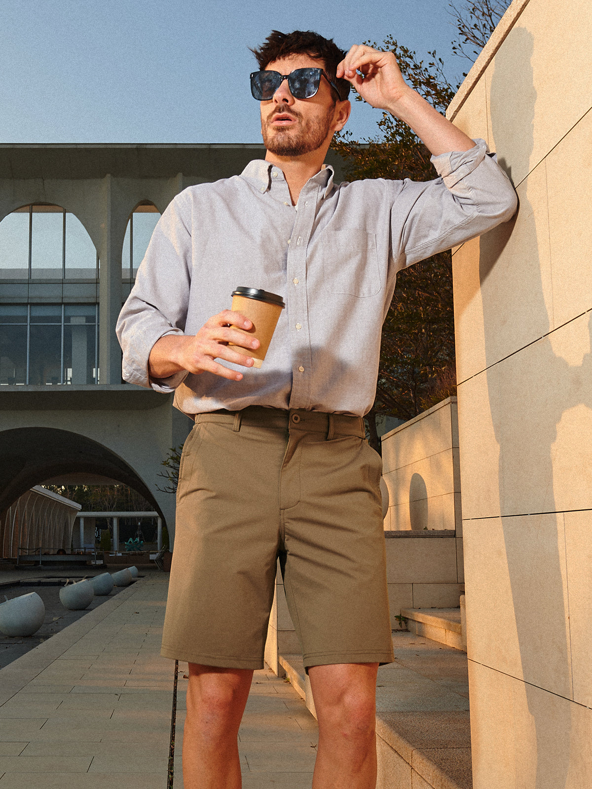 Darkkhaki Men's 9" Performance Golf Shorts On-Model - 4-Way Stretch Flat Front Casual Work Shorts