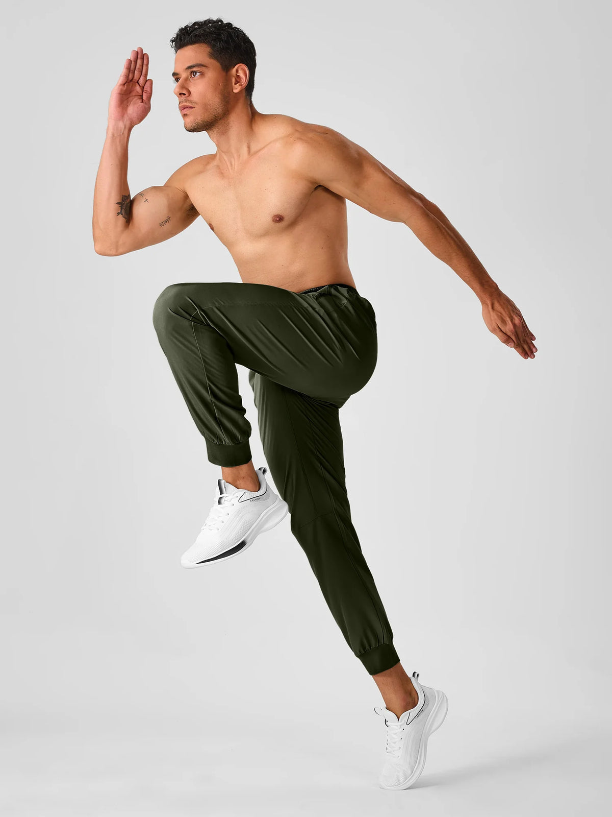 
Men's Tapered Running Workout Joggers with 3 Zipper Pockets — NORTHYARD men's army green tapered workout joggers, exercise styling — army green