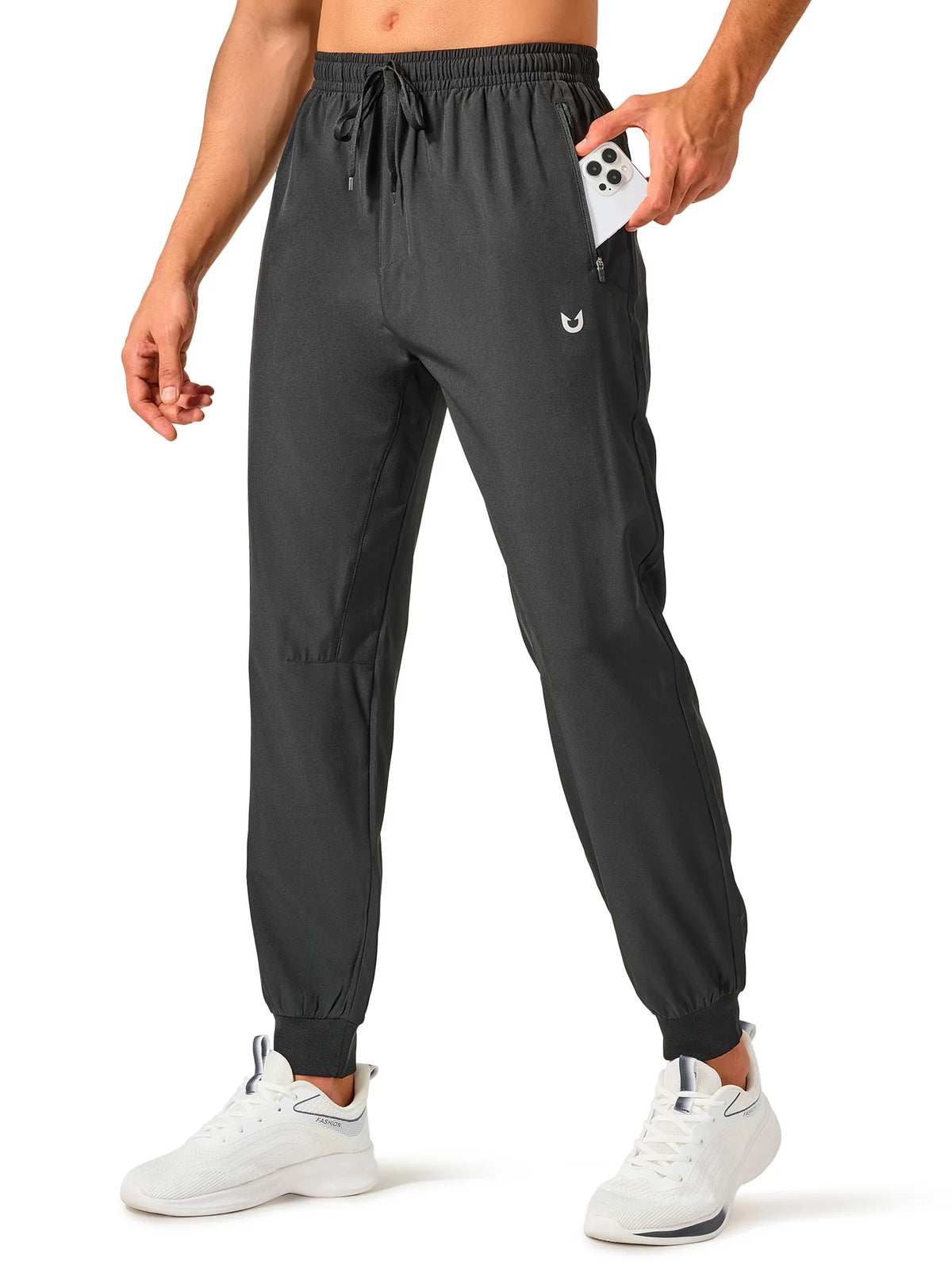 
Men's Tapered Running Workout Joggers with 3 Zipper Pockets — NORTHYARD men's black tapered workout joggers, front view on model — black