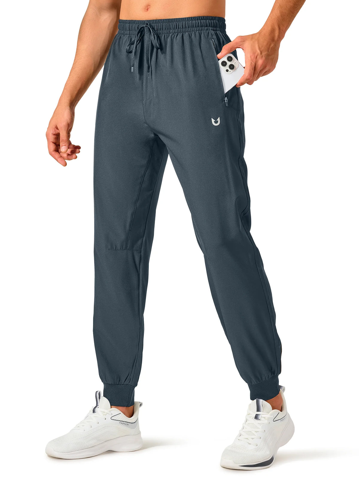 
Men's Tapered Running Workout Joggers with 3 Zipper Pockets — NORTHYARD men's cool grey tapered workout joggers, front view on model — cool grey