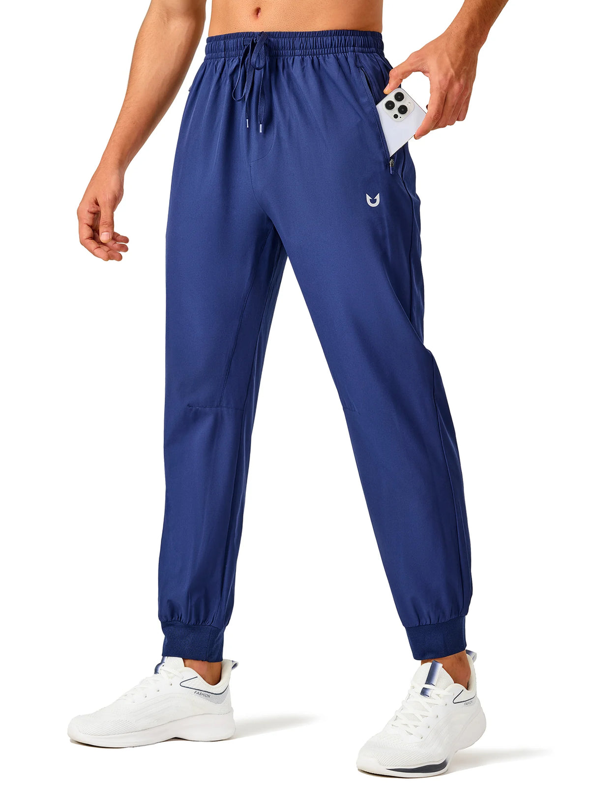 
Men's Tapered Running Workout Joggers with 3 Zipper Pockets — NORTHYARD men's dark blue tapered workout joggers, front view on model — dark blue