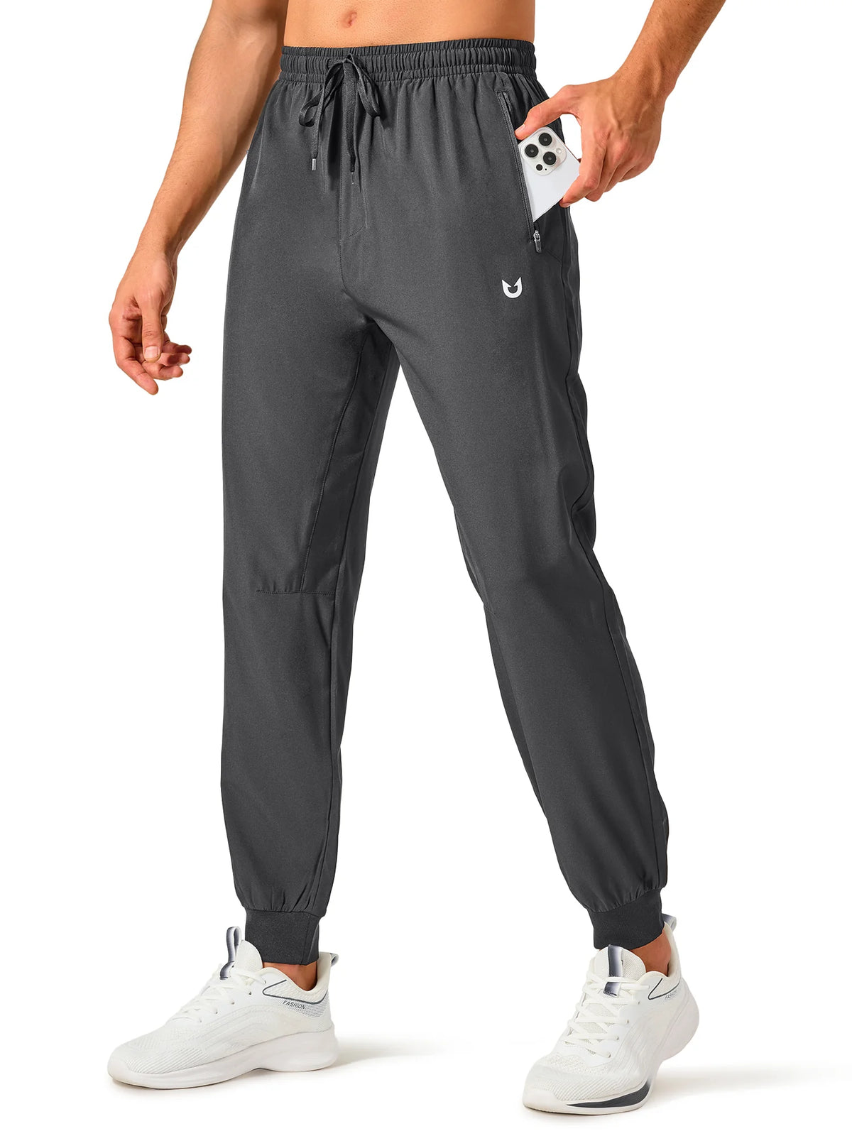 
Men's Tapered Running Workout Joggers with 3 Zipper Pockets — NORTHYARD men's dark grey tapered workout joggers, front view on model — dark grey