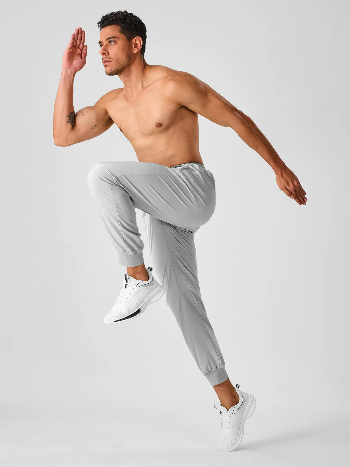 
Men's Tapered Running Workout Joggers with 3 Zipper Pockets — NORTHYARD men's light grey tapered workout joggers, exercise styling — light grey