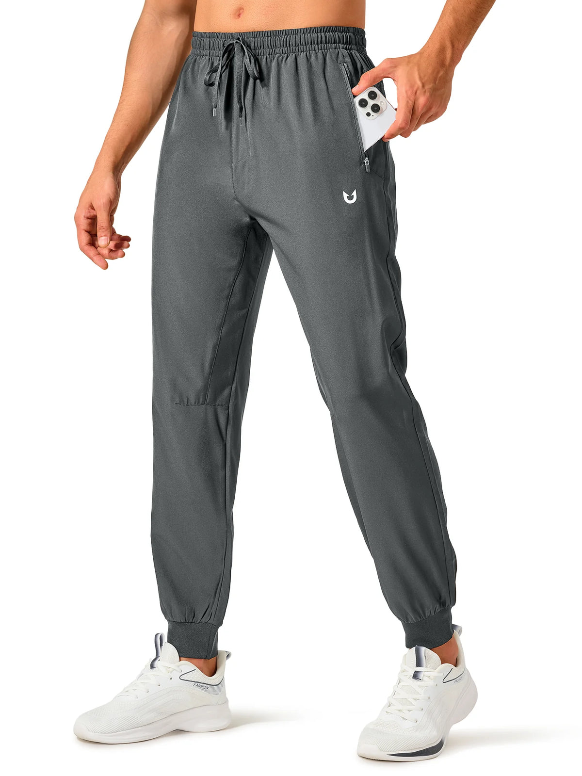 
Men's Tapered Running Workout Joggers with 3 Zipper Pockets — NORTHYARD men's smoke grey tapered workout joggers, front view on model — smoke grey