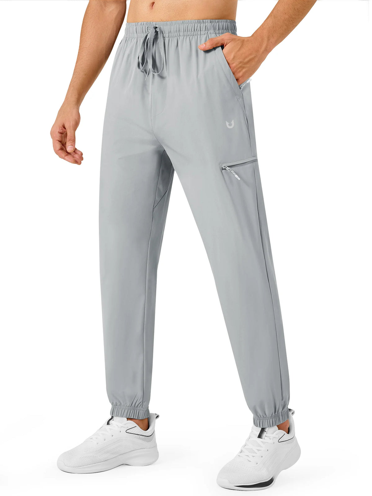 
Men's Lightweight Hiking Joggers with 4 Zipper Pockets — NORTHYARD men's light grey hiking joggers, front view on model — light grey